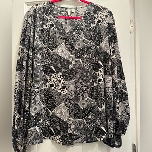 Black and white blouse, no tag, never been worn.